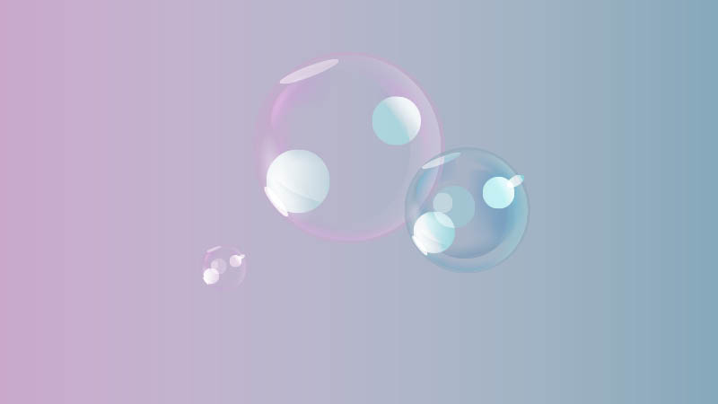 Bubbles of different sizes, floating in the air.